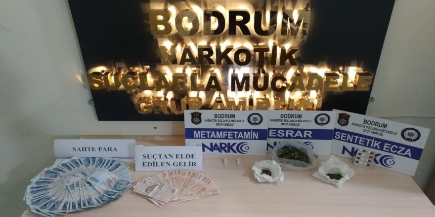 Muğla'nın Bodrum ilçesinde sahte para ve uyuşturucu ele geçirildi