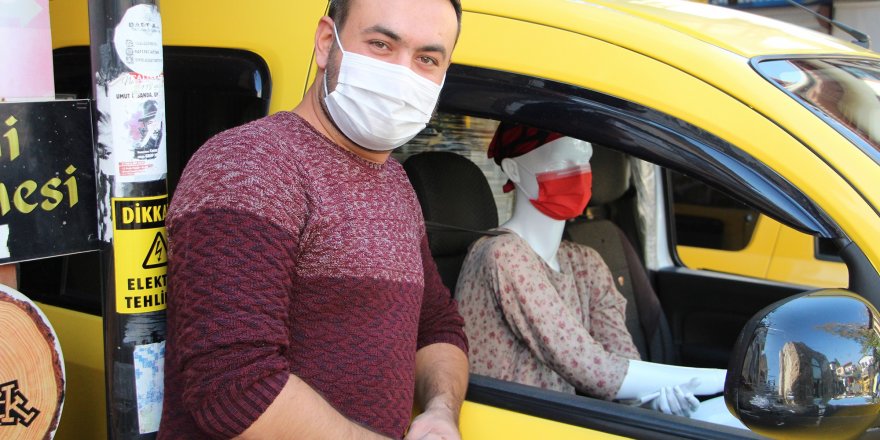 Antalya'da Taksiciden korona virüse cansız mankenli önlem