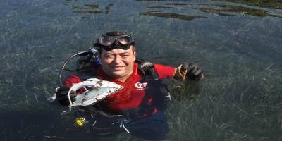 İlçe Başkanının denizin dibinden çıkarttığı çöpler ise herkesi şok etti