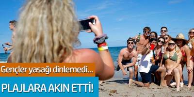 ABD'de gençler yasağı dinlemedi... Plajlara akın etti!