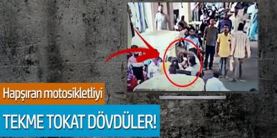 Hapşıran motosikletliyi tekme tokat dövdüler